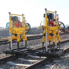 Machine de bourrage de rails